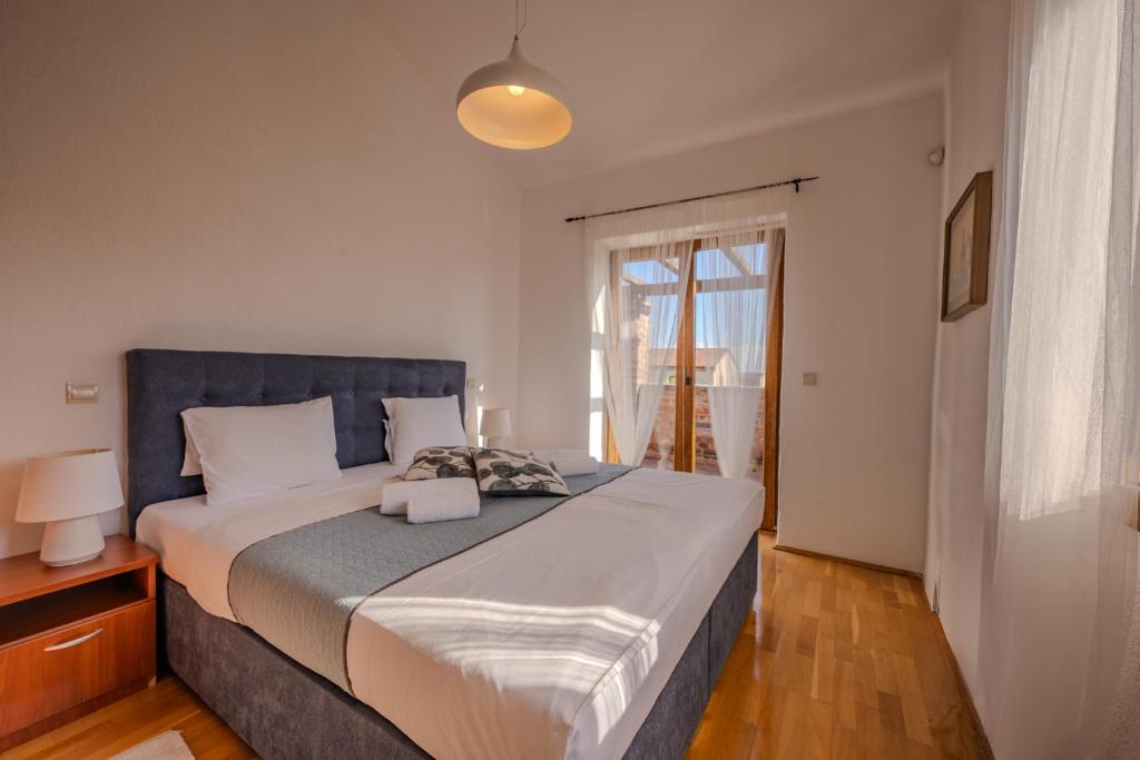 Postel nebo postele na pokoji v ubytování Villa Sonne in Paradis