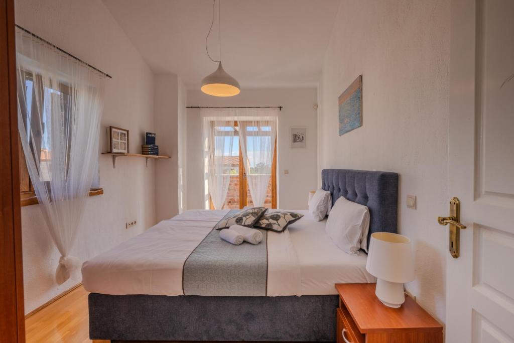 Postel nebo postele na pokoji v ubytování Villa Sonne in Paradis