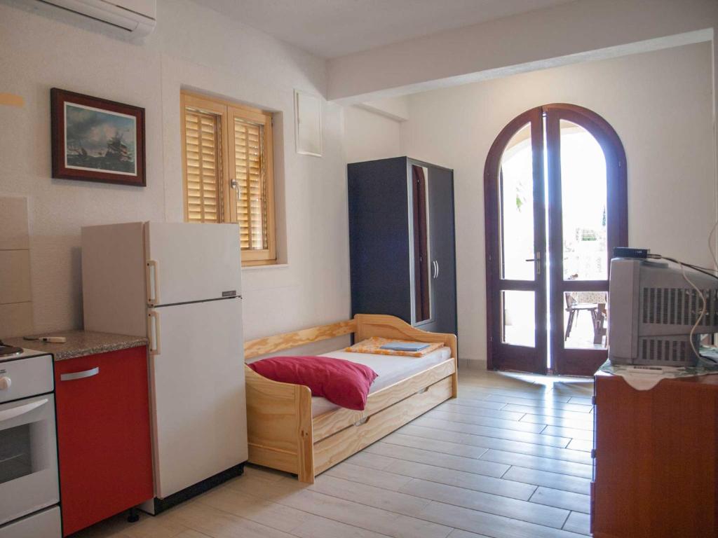 Postel nebo postele na pokoji v ubytování Villa Clematis