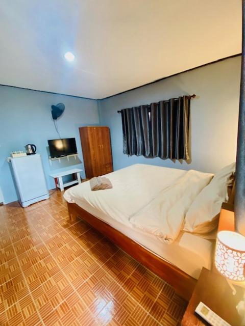 Postel nebo postele na pokoji v ubytování KANNIKA RESORT