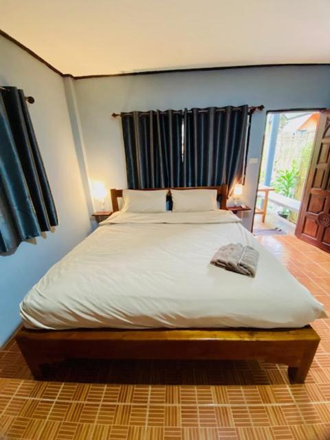 Postel nebo postele na pokoji v ubytování KANNIKA RESORT