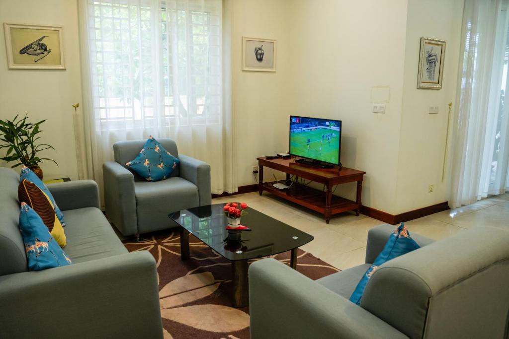 TV a/nebo společenská místnost v ubytování Siemreap Green Residence