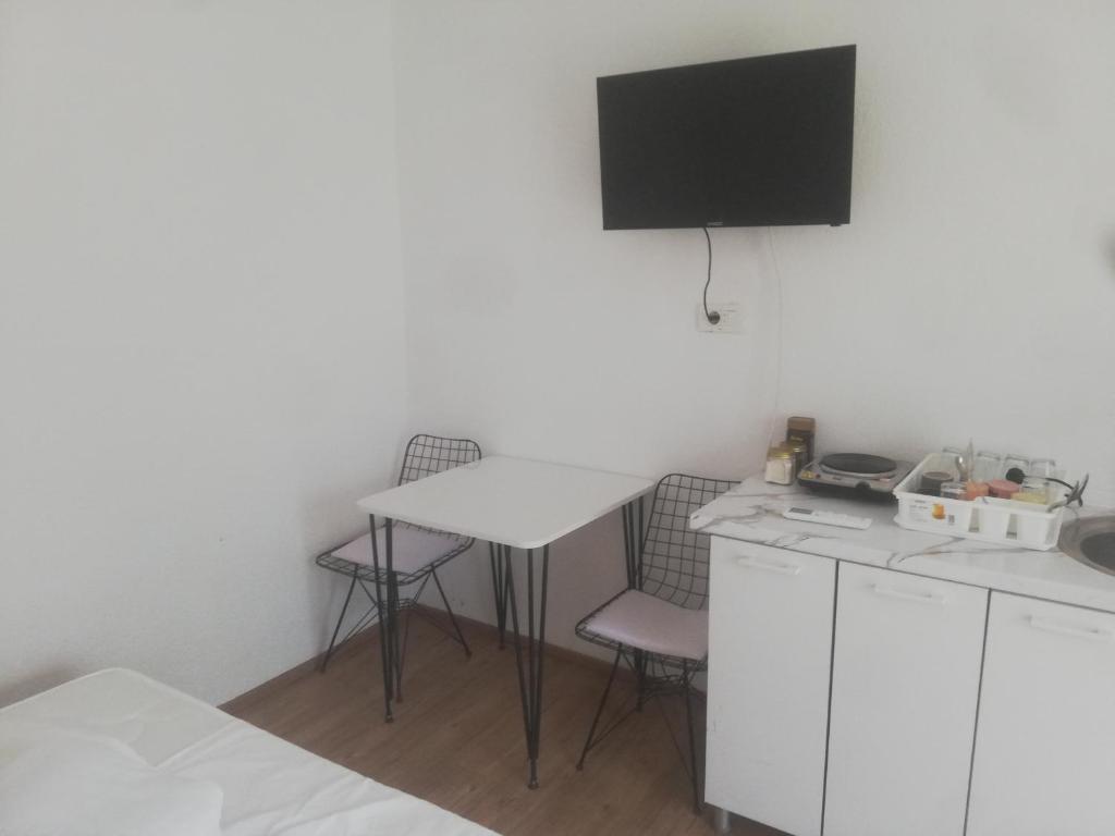 Kuchyň nebo kuchyňský kout v ubytování Hostel Vintage
