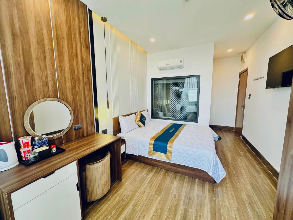 Postel nebo postele na pokoji v ubytování Hotel Phi Hùng
