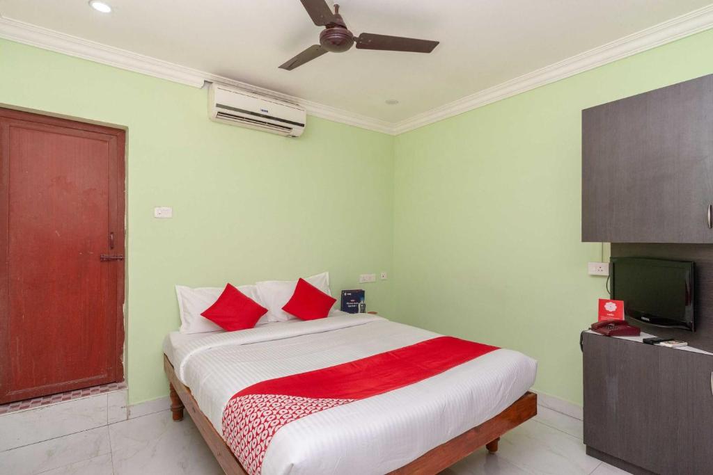 Postel nebo postele na pokoji v ubytování Hotel O Seabreeze Residency
