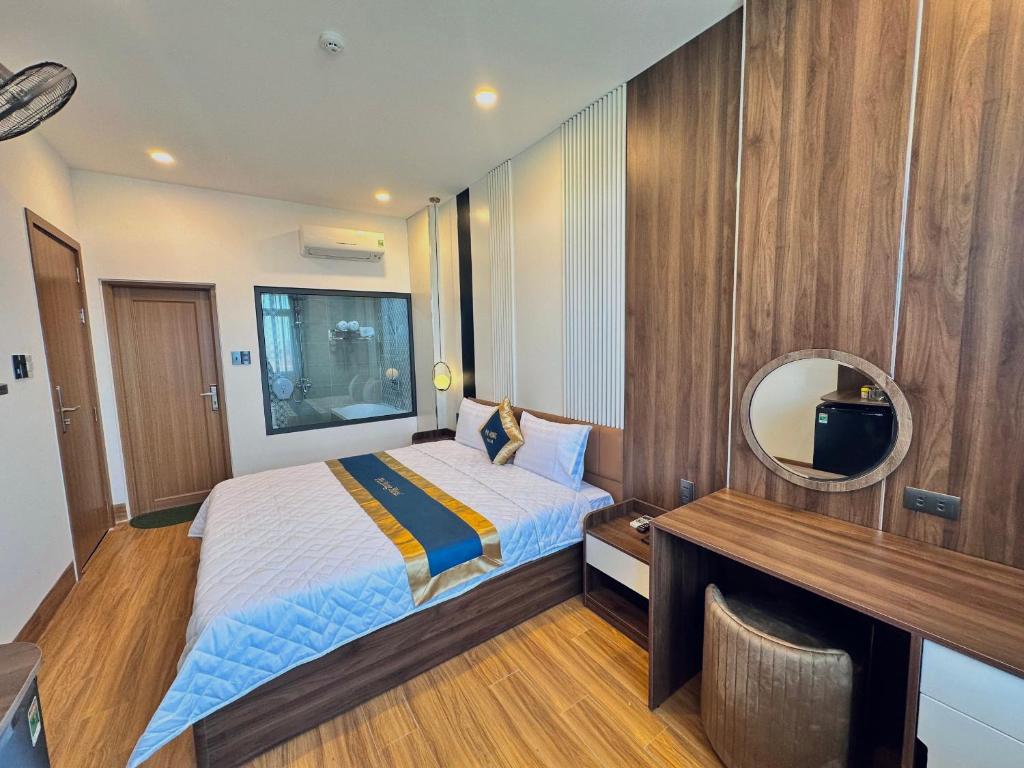 Postel nebo postele na pokoji v ubytování Hotel Phi Hùng