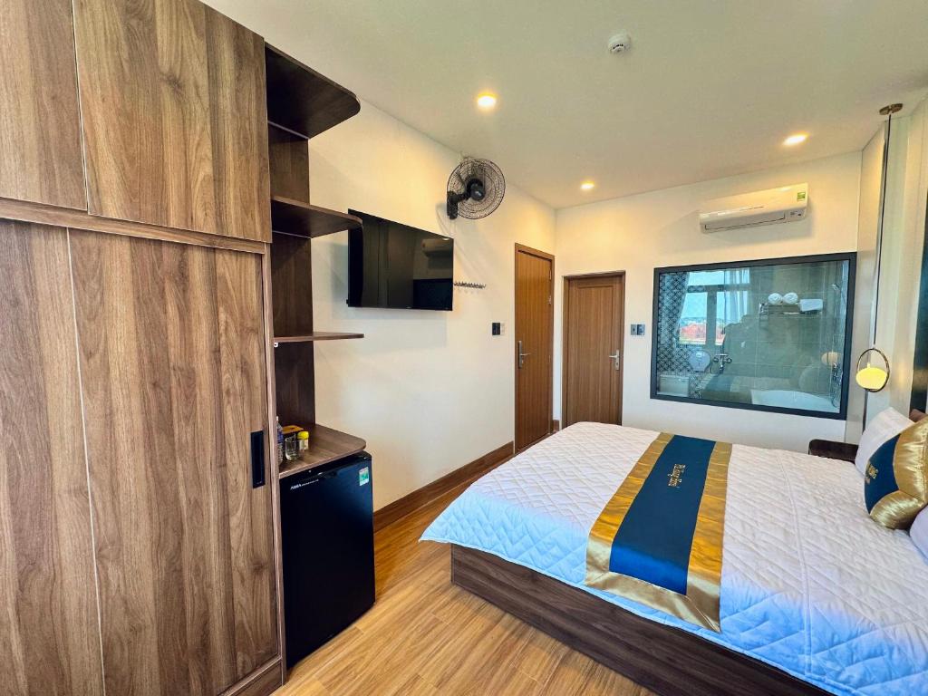 Postel nebo postele na pokoji v ubytování Hotel Phi Hùng