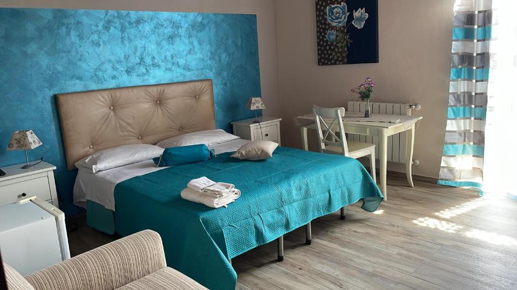 Postel nebo postele na pokoji v ubytování B&b Asterios