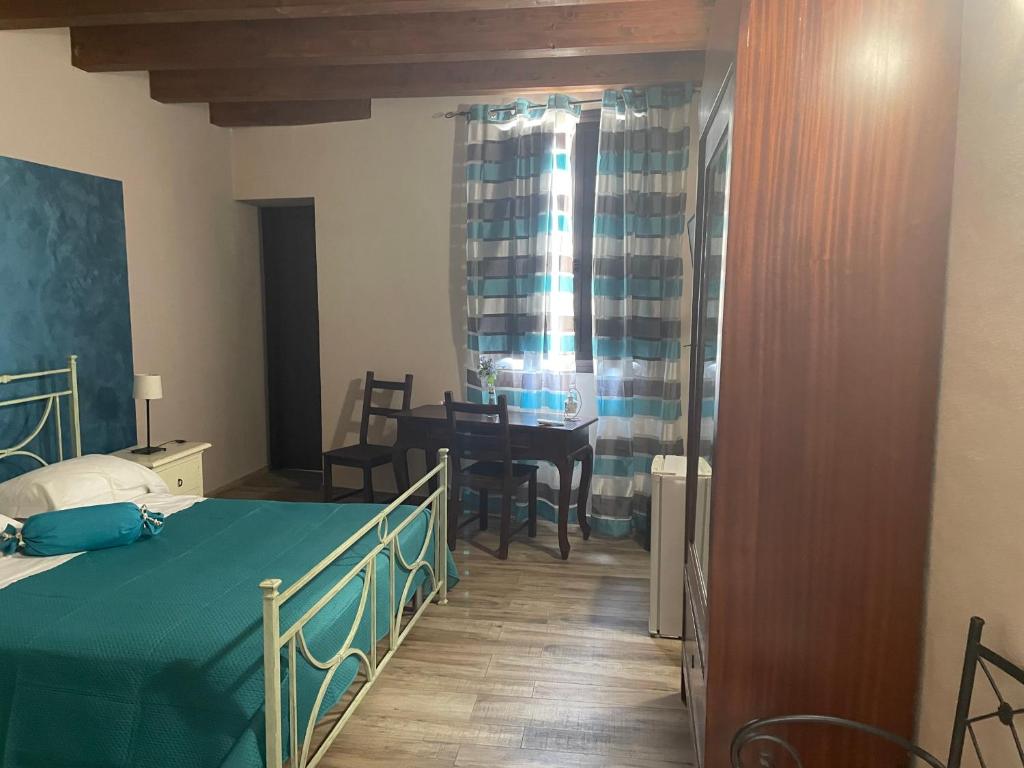 Postel nebo postele na pokoji v ubytování B&b Asterios