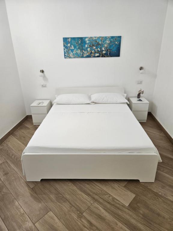 Postel nebo postele na pokoji v ubytování B&B Mormina