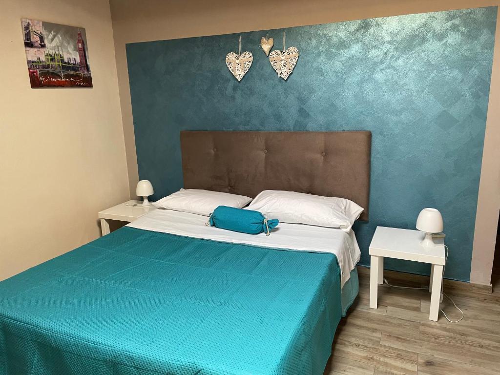 Postel nebo postele na pokoji v ubytování B&b Asterios