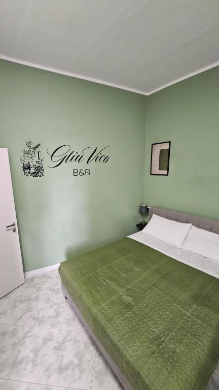 Postel nebo postele na pokoji v ubytování Gliù Vico