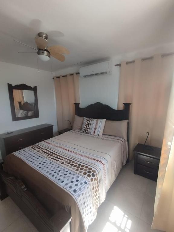 Postel nebo postele na pokoji v ubytování Caleta
