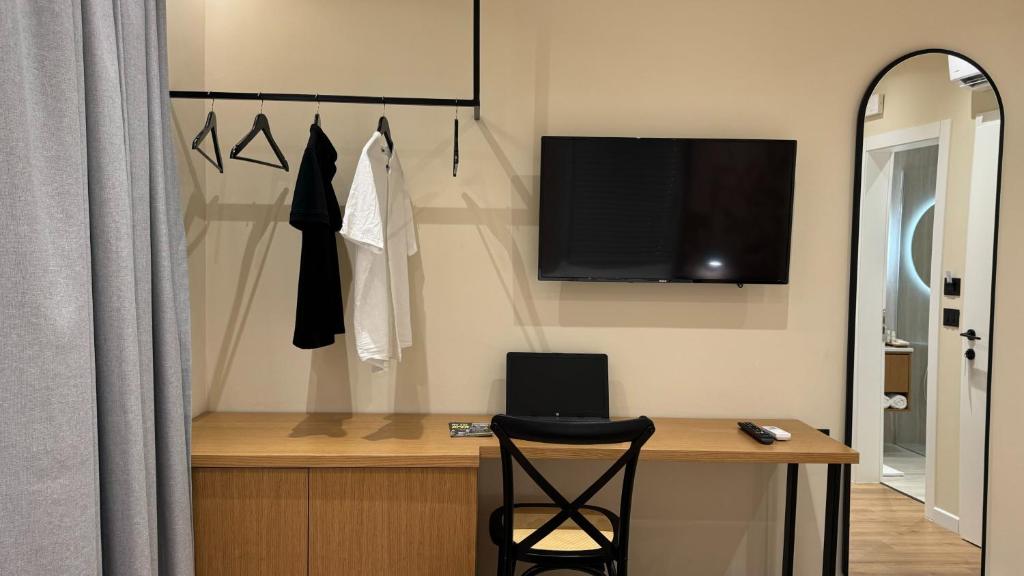 Sjónvarps- og/eða afþreyingartæki á Serenity Rooms