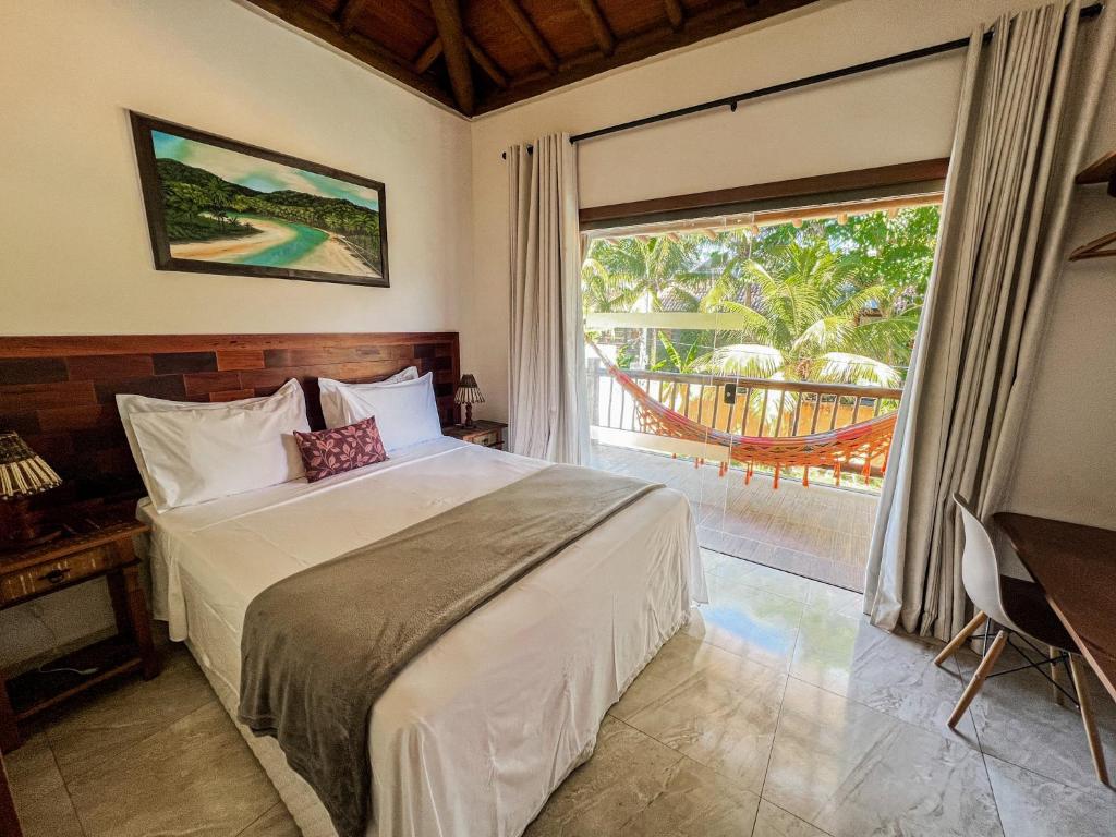 Voodi või voodid majutusasutuse Conchas do Mar Residence toas