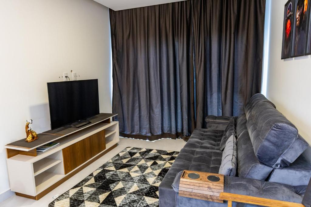 Μια τηλεόραση ή/και κέντρο ψυχαγωγίας στο Casa próx às 3 fronteiras e a 20min das Cataratas