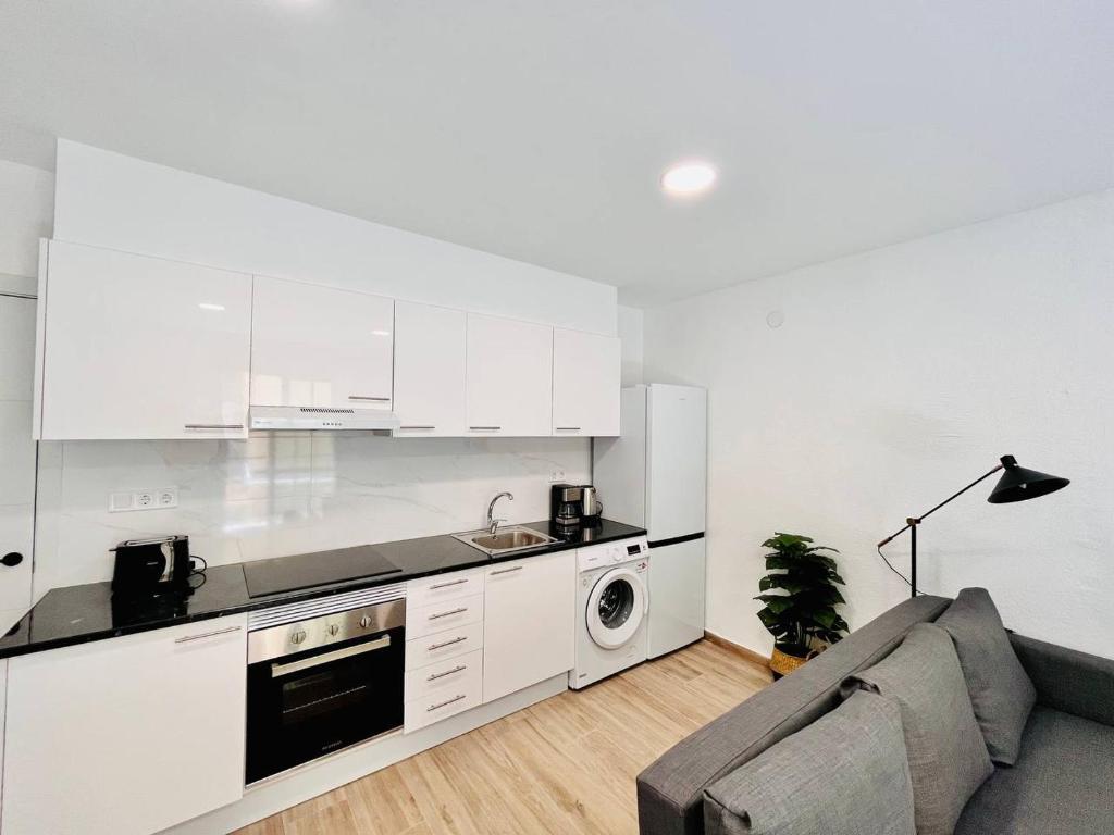 Kuchyň nebo kuchyňský kout v ubytování New central Residencie