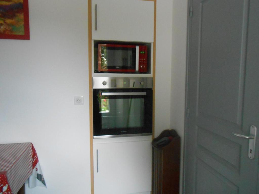 Kuchyň nebo kuchyňský kout v ubytování Maison Brix