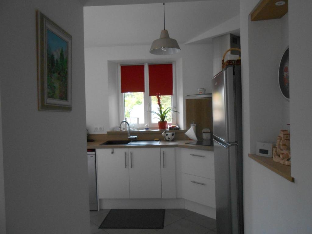 Kuchyň nebo kuchyňský kout v ubytování Maison Brix