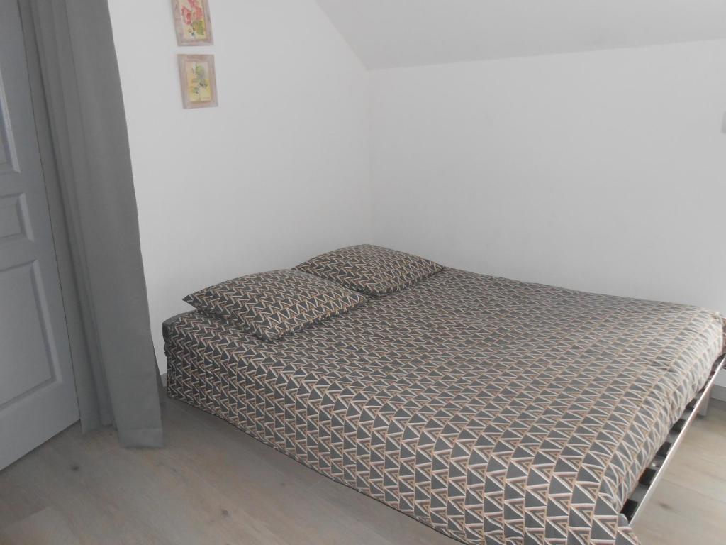 Postel nebo postele na pokoji v ubytování Maison Brix