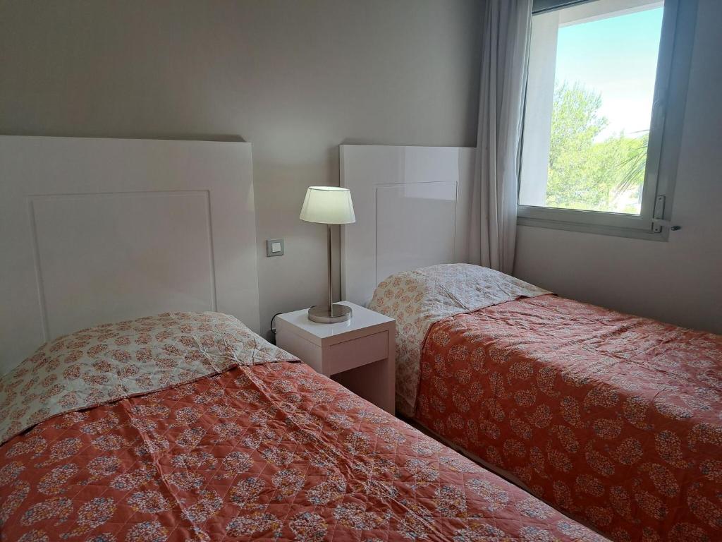 Postel nebo postele na pokoji v ubytování Apartment with pool in Orihuela