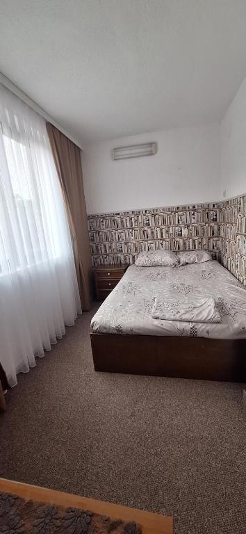 Postel nebo postele na pokoji v ubytování Ambient