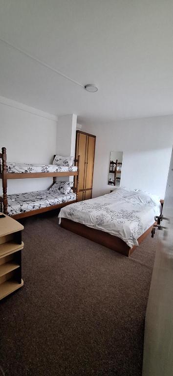 Postel nebo postele na pokoji v ubytování Ambient