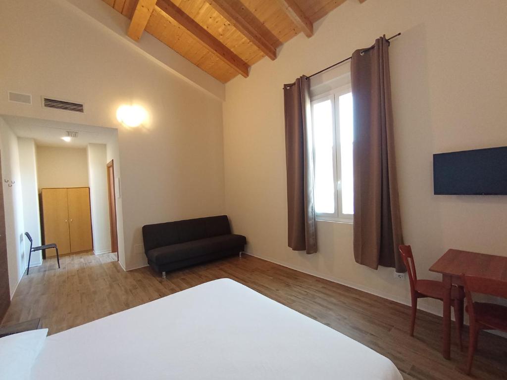 TV a/nebo společenská místnost v ubytování Casa nel borgo di Capraia