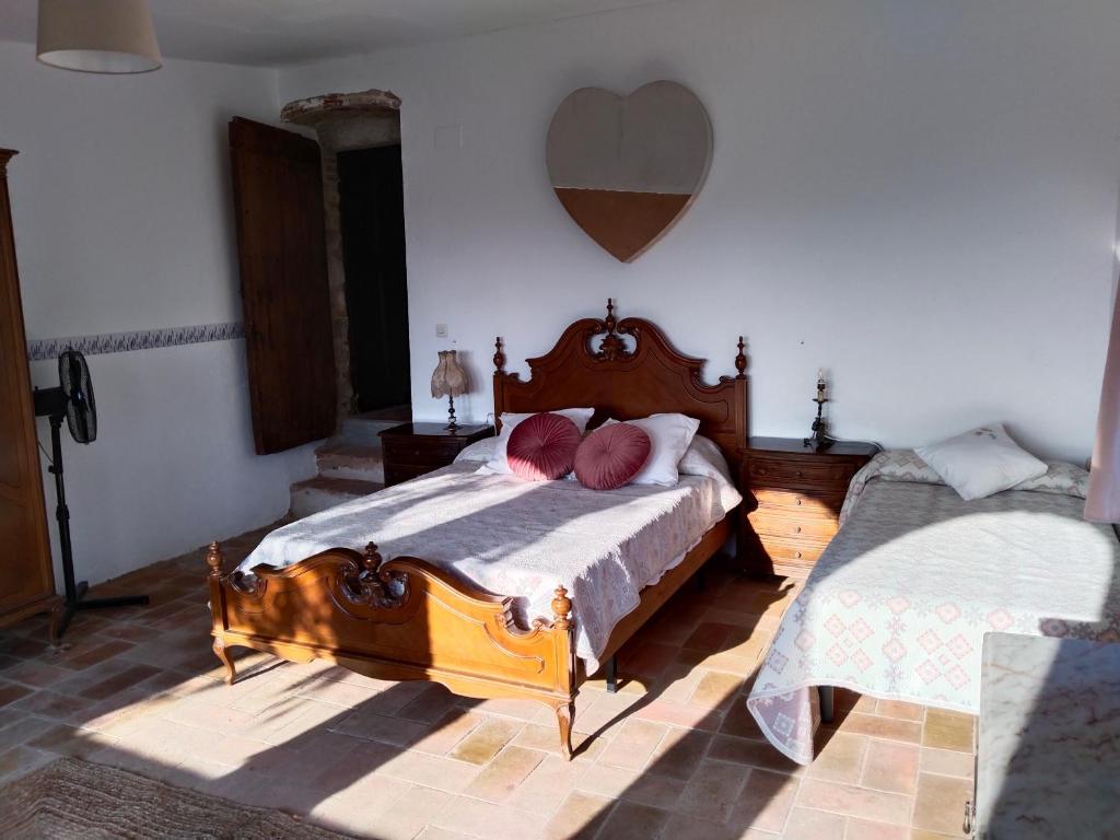 Postel nebo postele na pokoji v ubytování Can Camós - Masia Rural