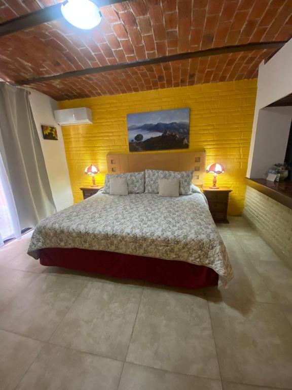 Postel nebo postele na pokoji v ubytování Hotel Villas Ajijic, Ajijic Chapala Jalisco