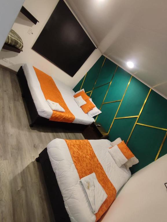 Postel nebo postele na pokoji v ubytování Hotel Kristal Ferial