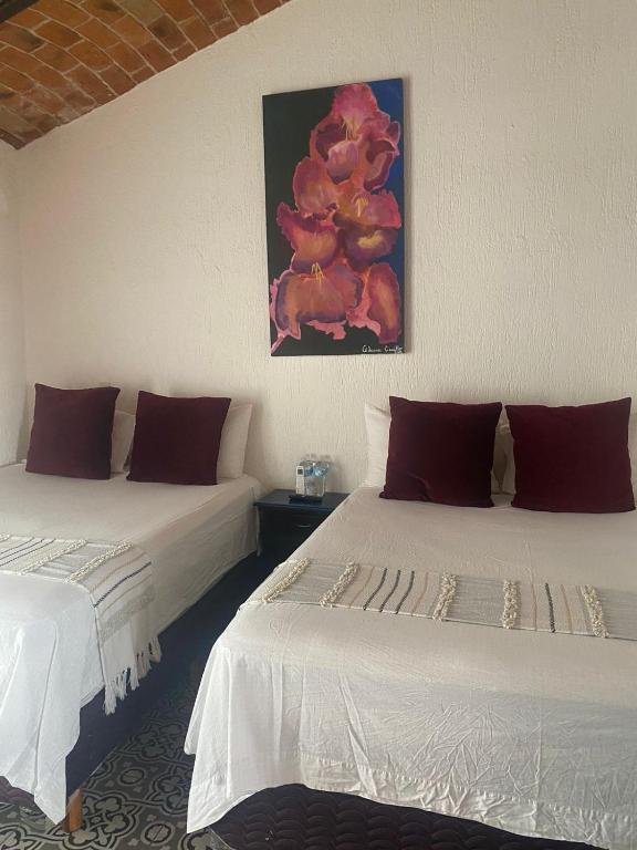Postel nebo postele na pokoji v ubytování Hotel Villas Ajijic, Ajijic Chapala Jalisco