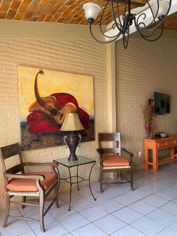TV a/nebo společenská místnost v ubytování Hotel Villas Ajijic, Ajijic Chapala Jalisco