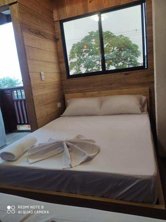 Postel nebo postele na pokoji v ubytování Petra Hotel