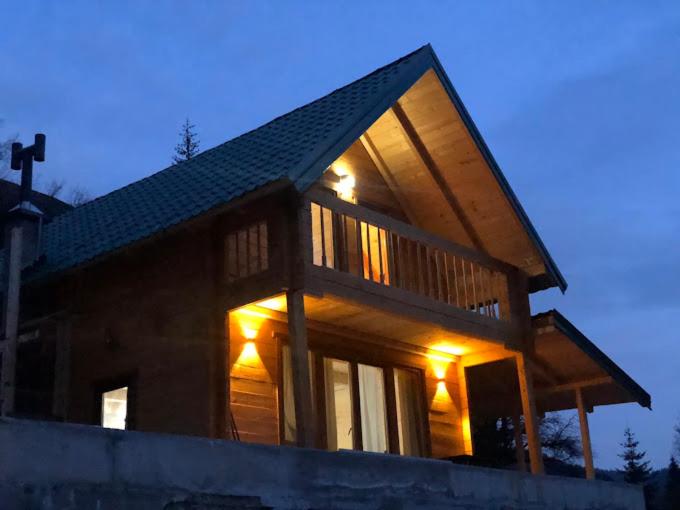 a house with lights on the front of it at Villa Klodi in Boge