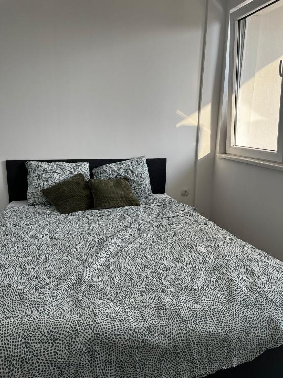Postel nebo postele na pokoji v ubytování Radojkovic LUX