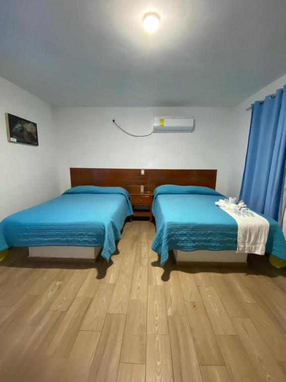 Postel nebo postele na pokoji v ubytování Hotel El Rincon de Don Juan