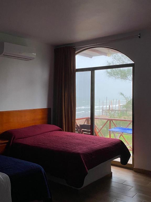 Postel nebo postele na pokoji v ubytování Hotel El Rincon de Don Juan