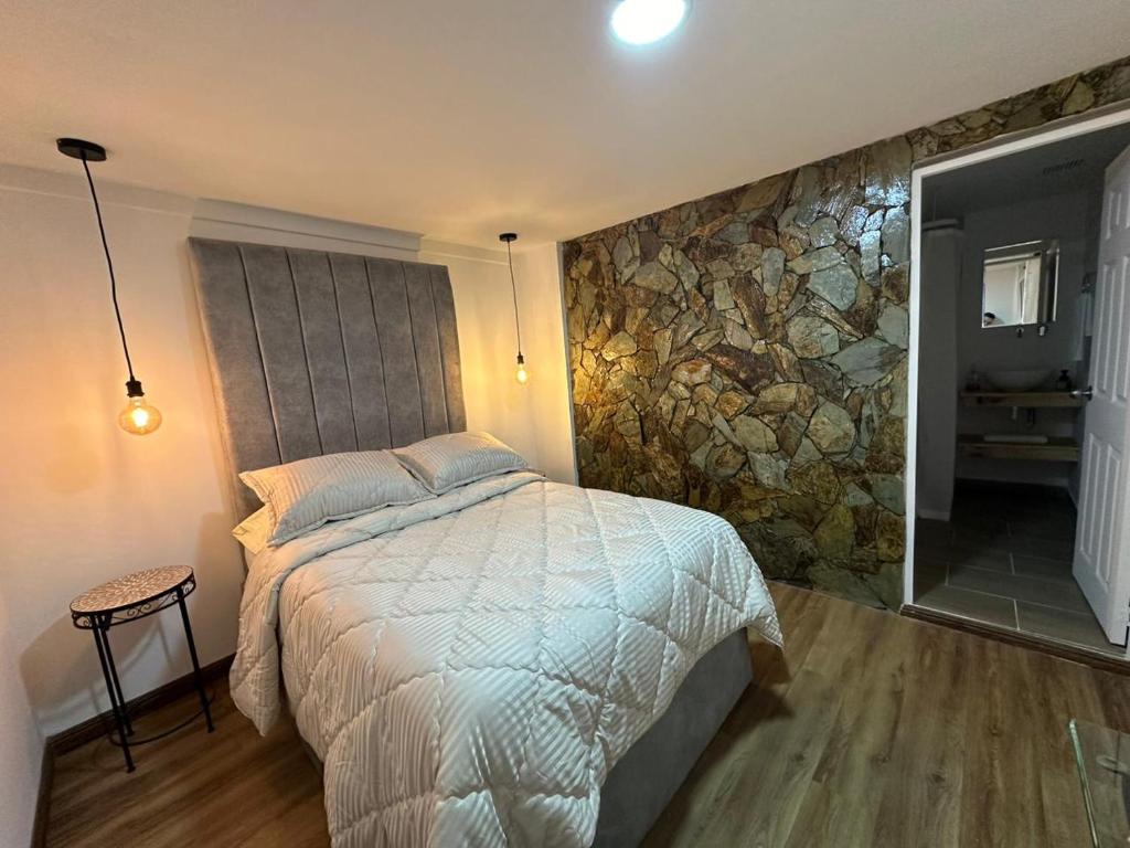 Postel nebo postele na pokoji v ubytování Casa colonial filandia