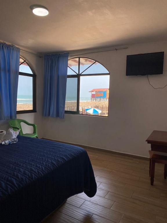 Postel nebo postele na pokoji v ubytování Hotel El Rincon de Don Juan