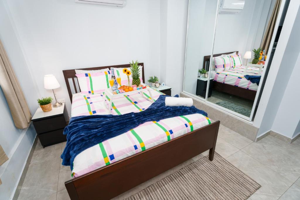 Postel nebo postele na pokoji v ubytování Somos Hotel San Juan