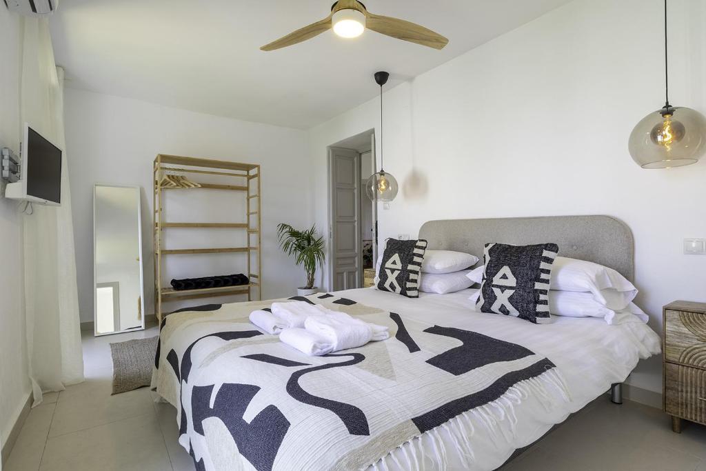 Postel nebo postele na pokoji v ubytování Casa Jardin Competa