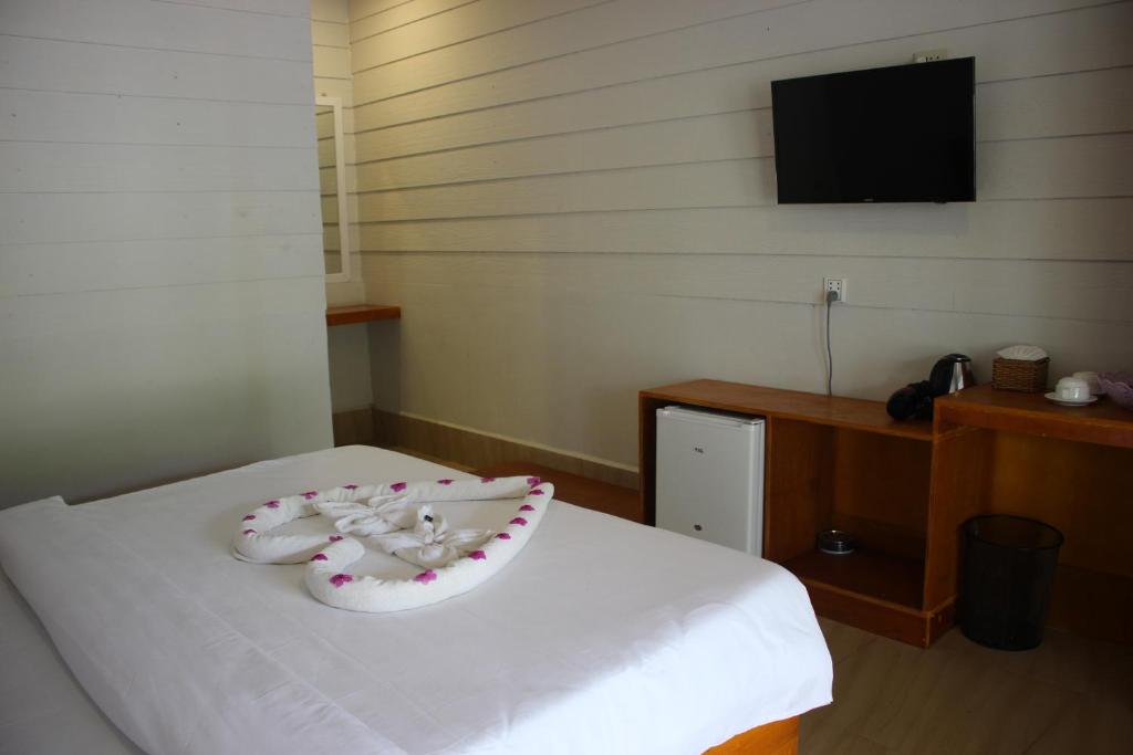 Postel nebo postele na pokoji v ubytování Scarlet Sails Hostel