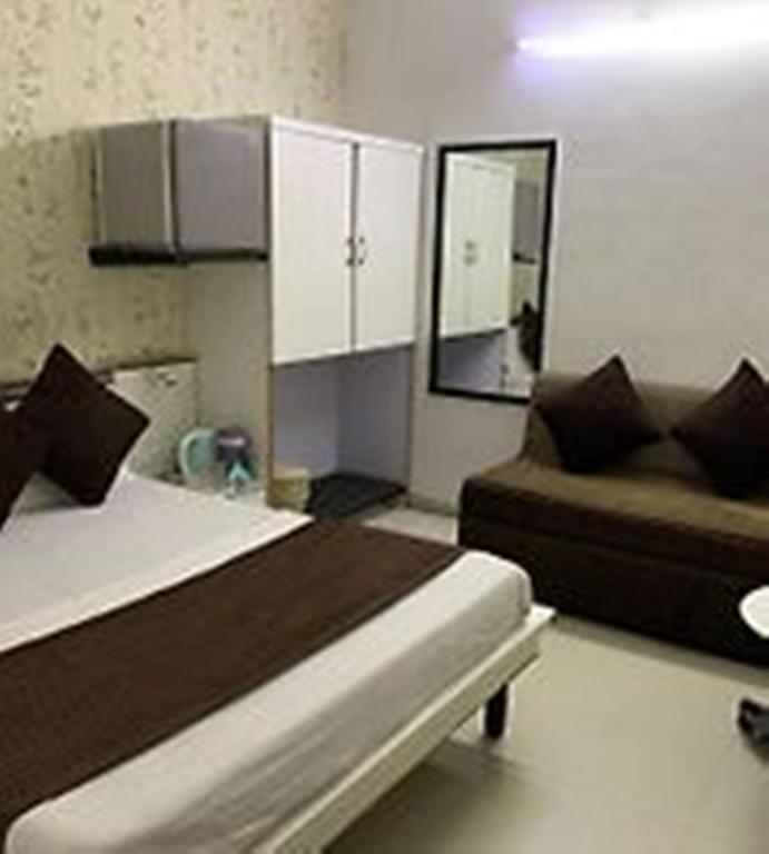 Postel nebo postele na pokoji v ubytování Hotel Chatako