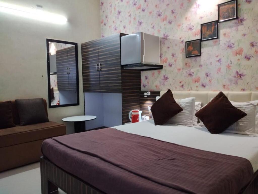 Postel nebo postele na pokoji v ubytování Hotel Chatako