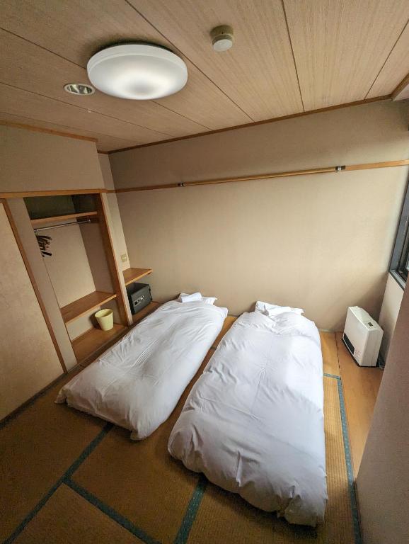 Postel nebo postele na pokoji v ubytování Gondola House
