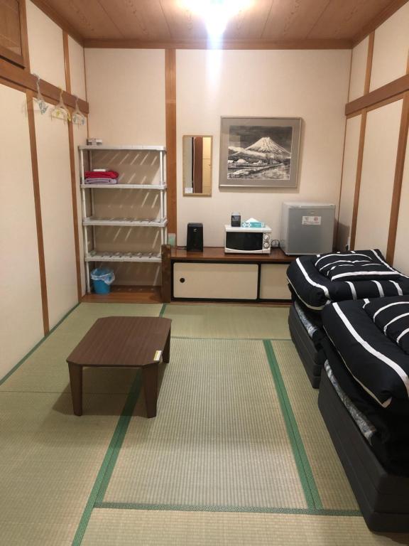 Postel nebo postele na pokoji v ubytování Mt Fuji Hostel Michael's