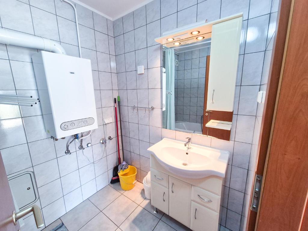 Kúpeľňa v ubytovaní Ildiko Apartmanhaz