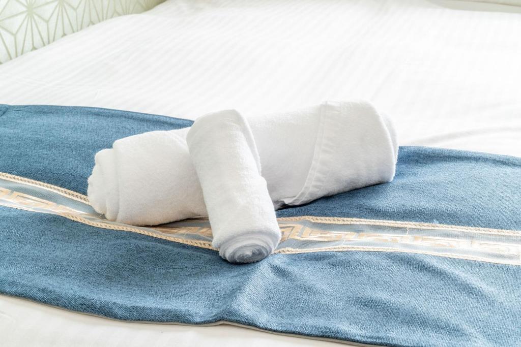 Postel nebo postele na pokoji v ubytování Plaza In Miyakojima hotel