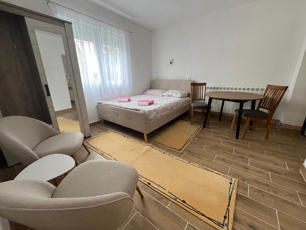 Un ou plusieurs lits dans un hébergement de l'établissement Apartment Phillip Studio